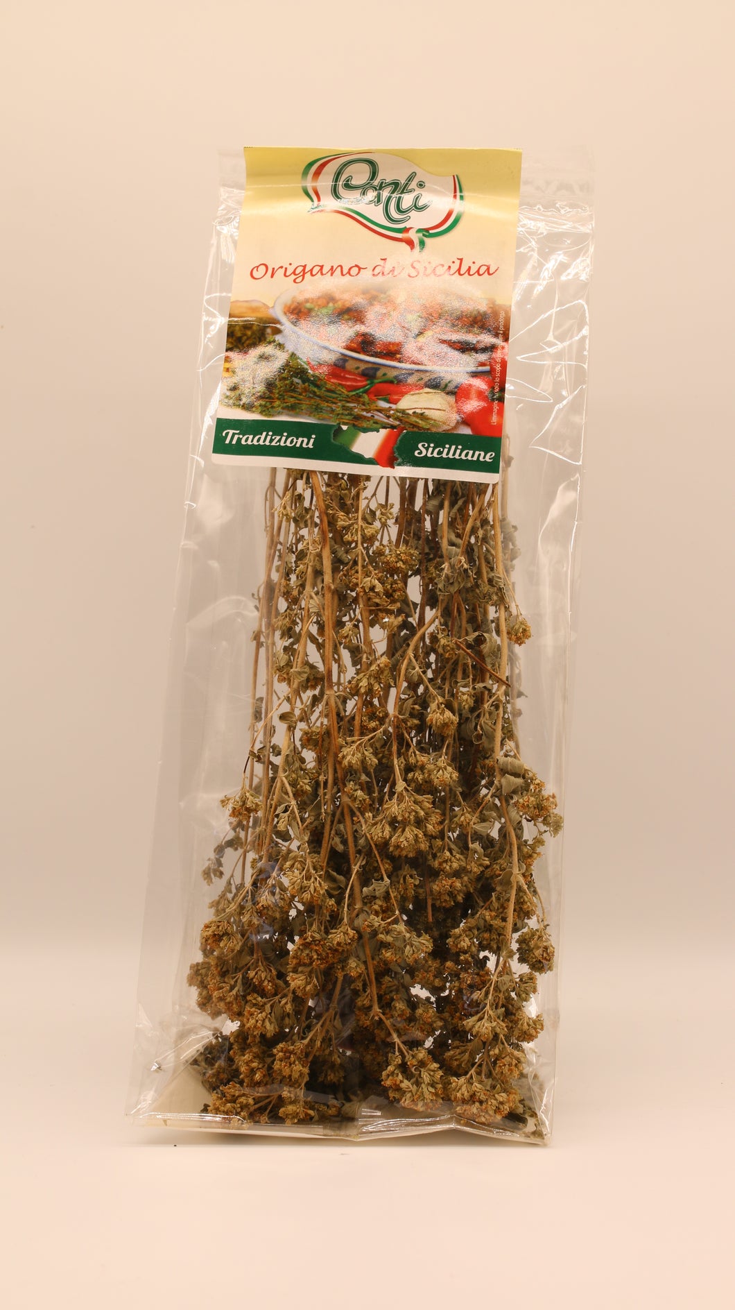 Ein durchsichtiger Plastikbeutel mit getrockneten Oregano-Zweigen, beschriftet mit 